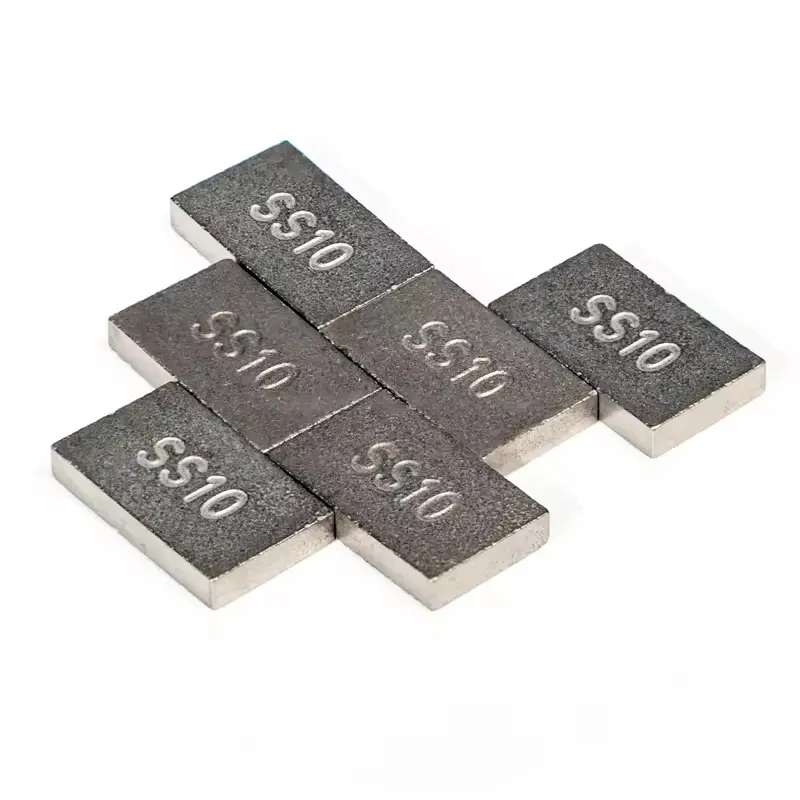 Welded block-shaped stone cutting tips