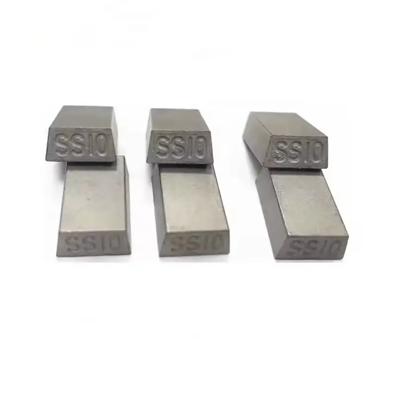 Welded stone cutting tips with clearance angle